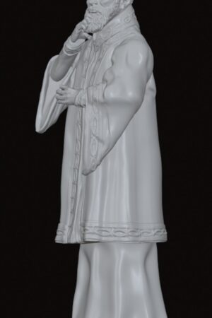 Statue of a bearded man in a ceremonial robe, hand to chin in a contemplative pose, long flowing cloak and detailed trim.