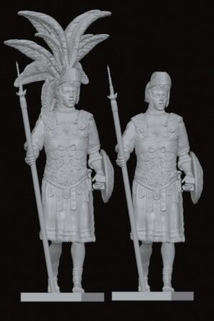 Two ornate armored warrior figurines standing side by side, each holding a spear and shield with tall feathered crests on their helmets.