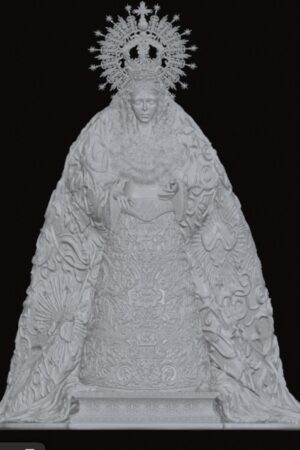 White sculpted statue of the Virgin Mary with an ornate crown and flowing, elaborately patterned robes, standing on a decorative pedestal against a dark background.