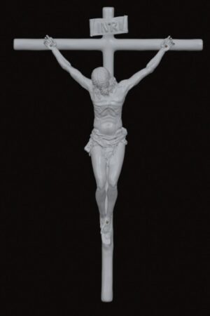 White crucifix statue of Jesus on a cross with INRI sign at the top against a black background.