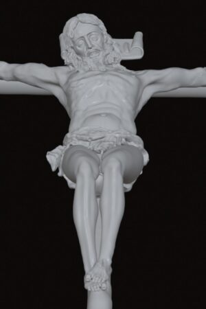 White crucifix sculpture of Jesus with outstretched arms against a black background.